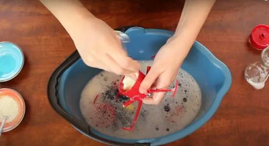Soak the Disassembled Feeder in Soapy Water